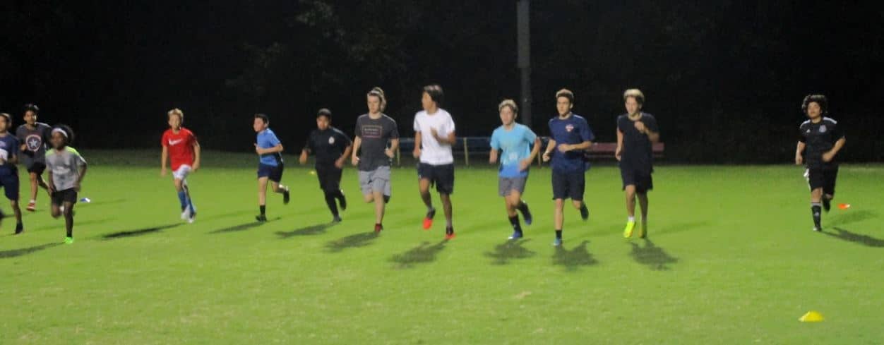 Youth Rec Soccer Team Running Sprints.