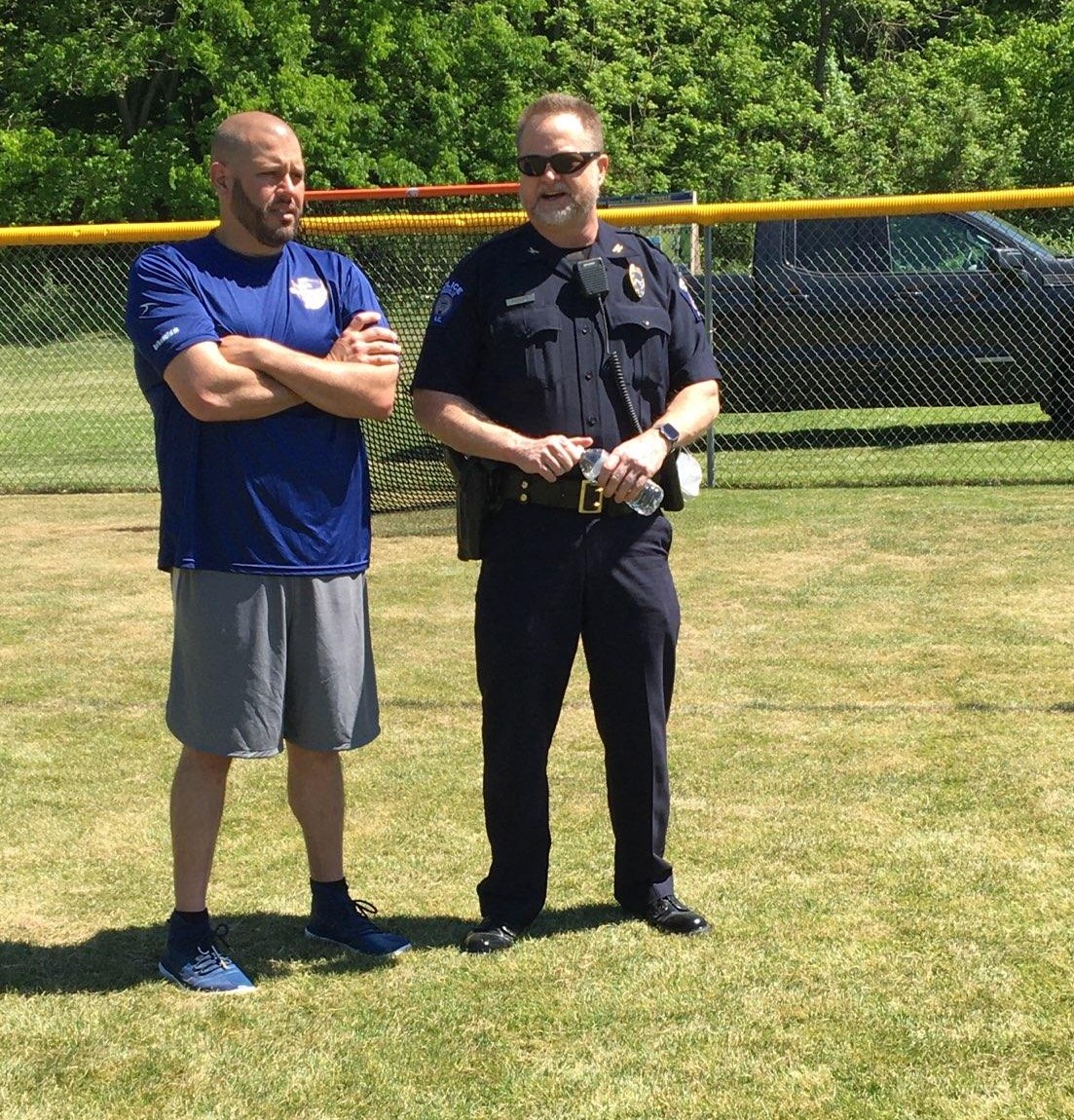 Chief Hudgins and Sergeant Harb coaching with Hope Soccer Ministries. 